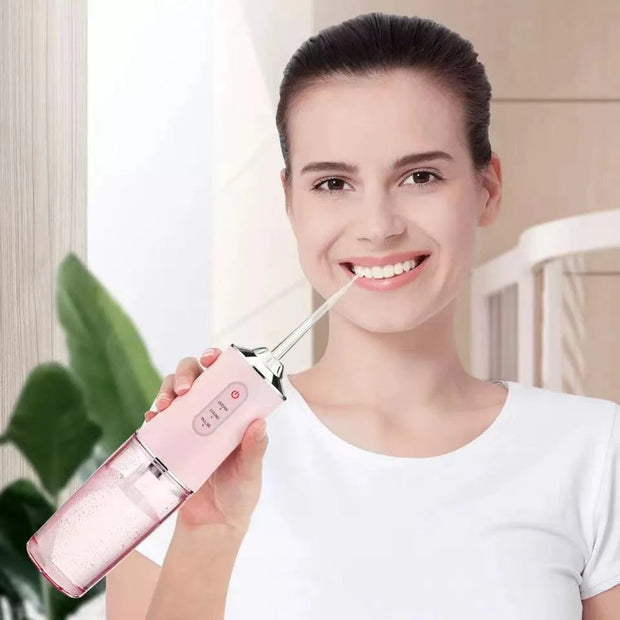 Dispositivo de irrigación dental profesional con cuatro cabezales.